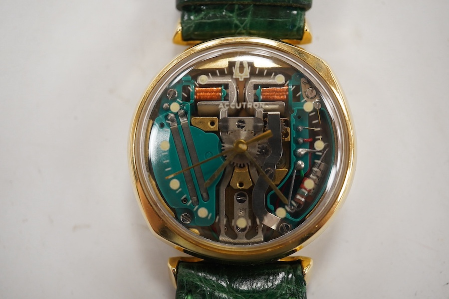 A gentleman's 1970's 14k Bulova Accutron wrist watch, the case back numbered 077471, case diameter 33mm, on a later associated leather strap, no box or papers. Condition - Not working otherwise fair to good